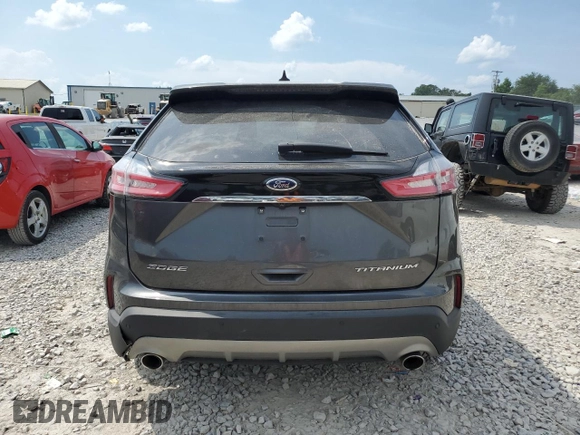 2020 Ford Edge Titanium with VIN 2FMPK3K9XLBB60780, listed as a Copart auction lot 62354735 with 60,328 mi miles and Salvage title. Bid and sale history available at DreamBid. Image 6.
