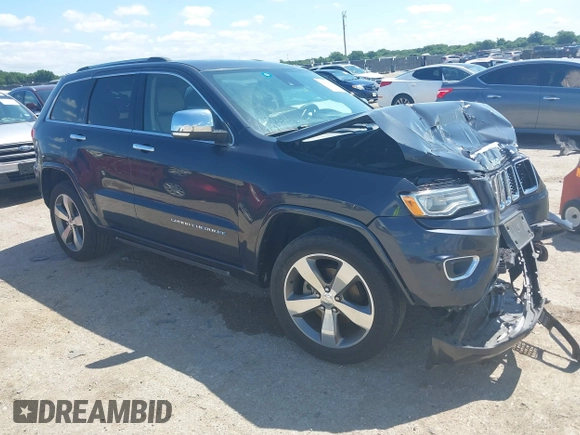 2015 Jeep Grand Cherokee High Altitude with VIN 1C4RJFCG5FC807394, listed as a IAAI auction lot 42452034 with 72,011 mi miles and . Bid and sale history available at DreamBid. Image 1.