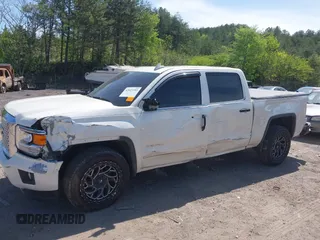 2015 GMC Sierra 1500 Denali with VIN 3GTU2WEJ7FG460695, listed as a IAAI auction lot 42023393 with 116,761 mi miles and . Bid and sale history available at DreamBid. Image 6.