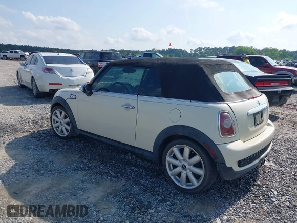 2010 MINI Convertible S with VIN WMWMS3C58ATY09098, listed as a IAAI auction lot 42149773 with 127,424 mi miles and . Bid and sale history available at DreamBid. Image 3.