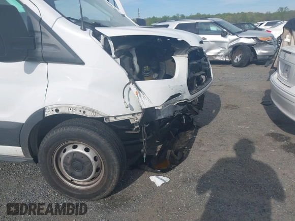2018 Ford Transit with VIN 1FTYE1YM1JKB29601, listed as a IAAI auction lot 42085587 with 146,846 mi miles and . Bid and sale history available at DreamBid. Image 6.