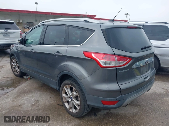2014 Ford Escape Titanium with VIN 1FMCU0JX8EUD31028, listed as a IAAI auction lot 41943690 with 91,295 mi miles. Bid and sale history available at carsss.com. Image 3.