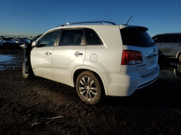 2012 Kia Sorento SX with VIN 5XYKWDA22CG243211, listed as a Copart auction lot 80150294 with 125,620 mi miles and Salvage Title. Bid and sale history available at carsss.com. Image 2.