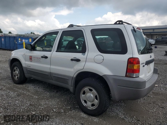 2001 Ford Escape XLS with VIN 1FMYU02161KB01283, listed as a Copart auction lot 59145105 with 86,195 mi miles and Salvage title. Bid and sale history available at DreamBid. Image 2.