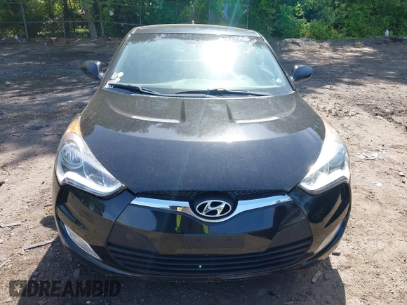 2013 Hyundai Veloster w/Black Int with VIN KMHTC6AD2DU120059, listed as a IAAI auction lot 42355902 with 81,221 mi miles and . Bid and sale history available at DreamBid. Image 6.