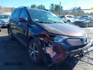2018 Toyota RAV4 XLE with VIN 2T3RFREV6JW839890, listed as a IAAI auction lot 41654804 with 72,038 mi miles. Bid and sale history available at carsss.com. Image 1.