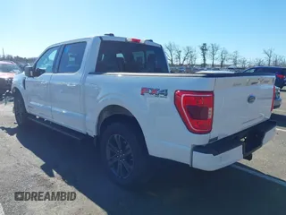 2023 Ford F-150 XL with VIN 1FTFW1ED0PFA18306, listed as a IAAI auction lot 41690965 with 49,988 mi miles. Bid and sale history available at carsss.com. Image 3.