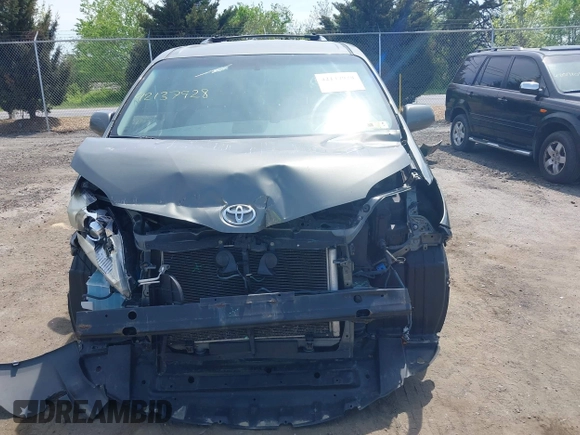 2011 Toyota Sienna LE AAS with VIN 5TDKK3DC7BS014356, listed as a IAAI auction lot 42137928 with 198,400 mi miles and . Bid and sale history available at DreamBid. Image 12.
