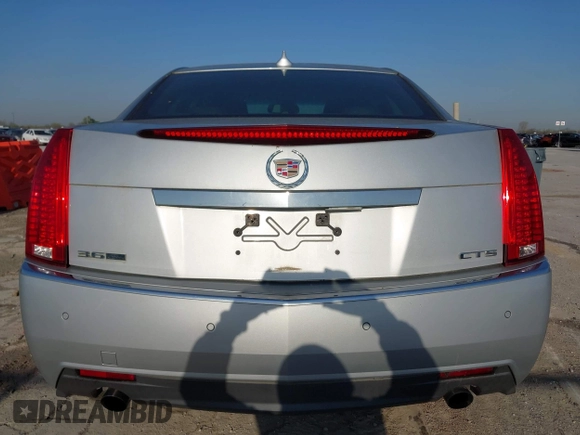2009 Cadillac CTS RWD with VIN 1G6DV57V590125951, listed as a IAAI auction lot 42005788 with 160,133 mi miles and . Bid and sale history available at carsss.com. Image 16.