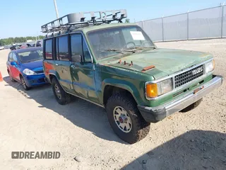 1990 Isuzu Trooper with VIN JACCH58R8L8918833, listed as a IAAI auction lot 42802414 with 371,103 mi miles and . Bid and sale history available at DreamBid. Image 1.