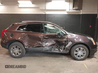 2015 Cadillac SRX Luxury Collection with VIN 3GYFNEE3XFS529754, listed as a IAAI auction lot 41727672 with 52,331 mi miles. Bid and sale history available at carsss.com. Image 6.
