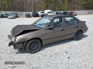 2000 Chevrolet Prizm z VIN 1Y1SK5282YZ411955, wystawiony jako Copart lot #49309415 z przebiegiem 74 097 mil mil oraz Tytuł czysty. Historia ofert i sprzedaży dostępna na DreamBid. Obrazek 1.