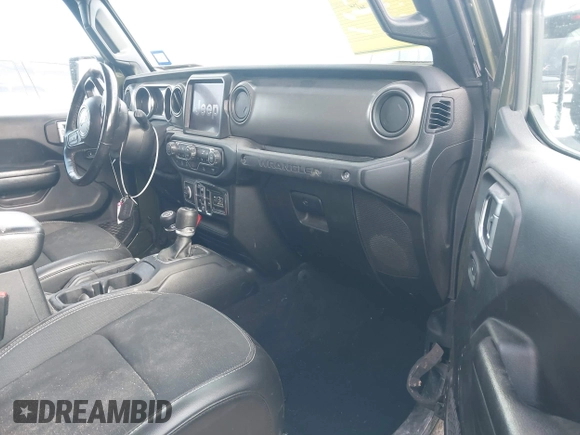 2021 Jeep Wrangler Unlimited Sport S with VIN 1C4HJXDN6MW669228, listed as a IAAI auction lot 42301326 with 64,503 mi miles and . Bid and sale history available at DreamBid. Image 5.