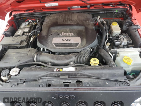 2015 Jeep Wrangler Sport with VIN 1C4AJWAG6FL715453, listed as a Copart auction lot 53686145 with 88,504 mi miles and Salvage Title. Bid and sale history available at DreamBid. Image 12.