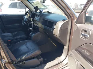 2014 Jeep Patriot Latitude with VIN 1C4NJPFA3ED928123, listed as a IAAI auction lot 41767231 with 136,318 mi miles and . Bid and sale history available at carsss.com. Image 5.