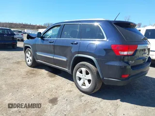 2011 Jeep Grand Cherokee Laredo with VIN 1J4RR4GG3BC670712, listed as a IAAI auction lot 41738127 with 93,714 mi miles and . Bid and sale history available at DreamBid. Image 3.
