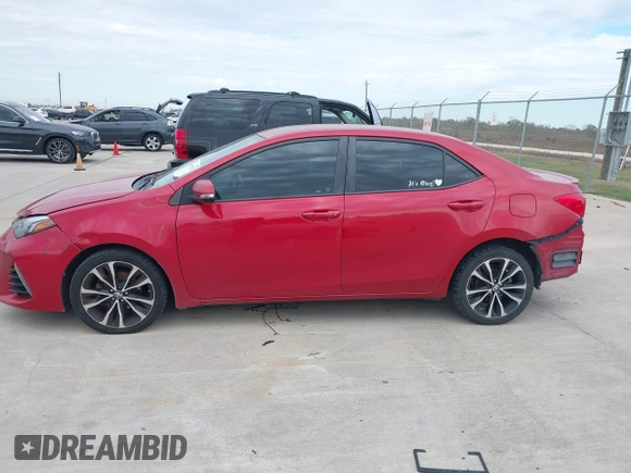 2017 Toyota Corolla L z VIN 5YFBURHE9HP610157, wystawiony jako IAAI lot #40999523 z przebiegiem 185 454 mil mil oraz . Historia ofert i sprzedaży dostępna na DreamBid. Obrazek 14.