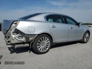 2013 Lincoln MKS with VIN 1LNHL9EK0DG612314, listed as a Copart auction lot 52901685 with 124,828 mi miles and Salvage title. Bid and sale history available at DreamBid. Image 3.