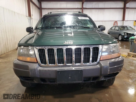 2000 Jeep Grand Cherokee Laredo with VIN 1J4GW48S2YC256123, listed as a Copart auction lot 56015855 with 147,549 mi miles and Salvage title. Bid and sale history available at DreamBid. Image 5.