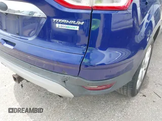 2014 Ford Escape Titanium с VIN 1FMCU0J96EUA61153, выставлен на аукционе IAAI как лот 41807295 с пробегом 159 036 миль миль и . История ставок и продаж доступна на DreamBid. Изображение 13.