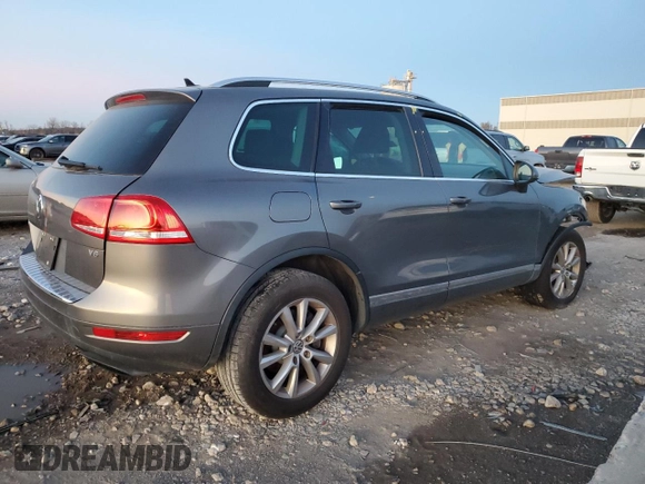 2013 Volkswagen Touareg Lux with VIN WVGEF9BP9DD008935, listed as a Copart auction lot 79859394 with Not Provided miles and Salvage Title. Bid and sale history available at DreamBid. Image 3.