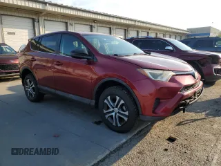 2018 Toyota RAV4 LE with VIN 2T3BFREV7JW723938, listed as a Copart auction lot 62814195 with 107,051 mi miles and Salvage title. Bid and sale history available at DreamBid. Image 4.