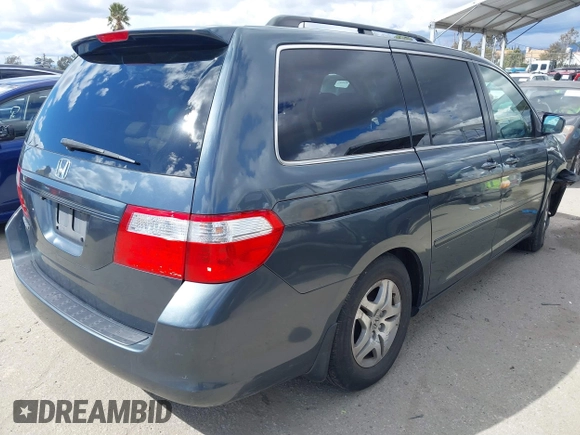 2006 Honda Odyssey EX-L with VIN 5FNRL38626B461798, listed as a IAAI auction lot 41751495 with 125,952 mi miles. Bid and sale history available at carsss.com. Image 4.