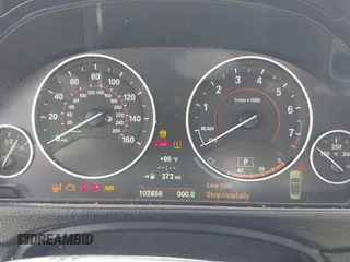 2014 BMW 4 Series 428i xDrive with VIN WBA3T1C56EPS98728, listed as a IAAI auction lot 42092079 with 102,856 mi miles and . Bid and sale history available at carsss.com. Image 7.