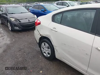 2015 Kia Forte LX with VIN KNAFK4A61F5374690, listed as a IAAI auction lot 42052849 with 47,034 mi miles. Bid and sale history available at carsss.com. Image 6.