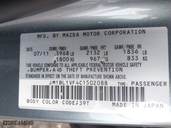 2012 Mazda Mazda3 i Touring with VIN JM1BL1VF4C1502088, listed as a IAAI auction lot 41474683 with 138,156 mi miles. Bid and sale history available at carsss.com. Image 9.