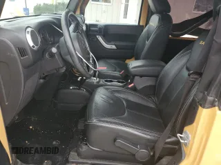 2014 Jeep Wrangler Sahara with VIN 1C4AJWBG8EL144691, listed as a Copart auction lot 71172514 with 111,322 mi miles and Salvage title. Bid and sale history available at DreamBid. Image 7.