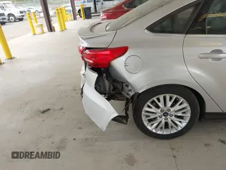 2017 Ford Focus Titanium с VIN 1FADP3J29HL329410, выставлен на аукционе IAAI как лот 42493519 с пробегом 22 639 миль миль и . История ставок и продаж доступна на DreamBid. Изображение 6.