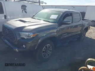 2023 Toyota Tacoma 4WD SR with VIN 3TYCZ5ANXPT119342, listed as a IAAI auction lot 41683675 with 45,188 mi miles. Bid and sale history available at carsss.com. Image 2.