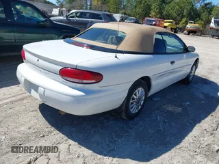 1996 Chrysler Sebring with VIN 3C3EL45X2TT307062, listed as a IAAI auction lot 41683313 with 37,004 mi miles and . Bid and sale history available at DreamBid. Image 4.