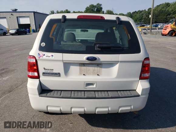 2010 Ford Escape XLS with VIN 1FMCU0C76AKB82752, listed as a Copart auction lot 57626565 with 194,931 mi miles and Salvage title. Bid and sale history available at DreamBid. Image 6.