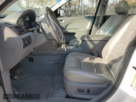 2005 Ford Five Hundred SEL with VIN 1FAFP24135G191762, listed as a Copart auction lot 77334394 with 117,630 mi miles and Salvage Title. Bid and sale history available at carsss.com. Image 7.