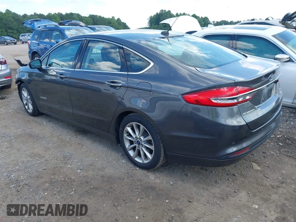2017 Ford Fusion Hybrid SE z VIN 3FA6P0LU3HR260558, wystawiony jako IAAI lot #42657176 z przebiegiem 161 183 mil mil oraz . Historia ofert i sprzedaży dostępna na DreamBid. Obrazek 3.