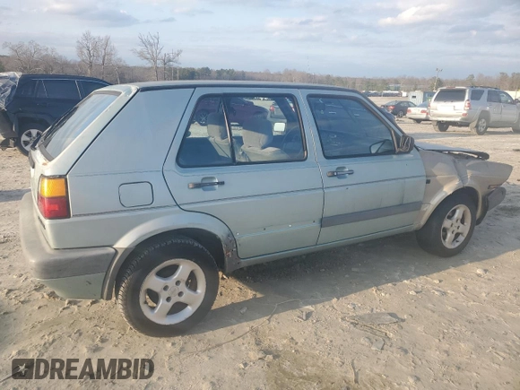 1992 Volkswagen Golf с VIN 3VWFA21G2NM043514, выставлен на аукционе Copart как лот 42501035 с пробегом 267 345 миль миль и Списание • Salvage title. История ставок и продаж доступна на DreamBid. Изображение 3.