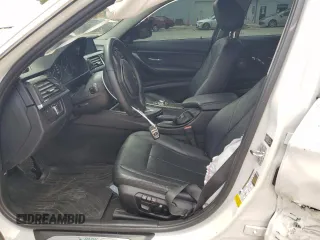 2012 BMW 3 Series 328i with VIN WBA3A5C55CF259337, listed as a Copart auction lot 63327925 with 132,019 mi miles and Salvage title. Bid and sale history available at DreamBid. Image 7.
