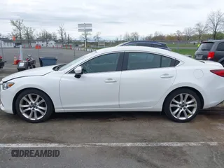 2014 Mazda 6 i Touring with VIN JM1GJ1V59E1109421, listed as a IAAI auction lot 42094480 with 153,287 mi miles. Bid and sale history available at carsss.com. Image 14.
