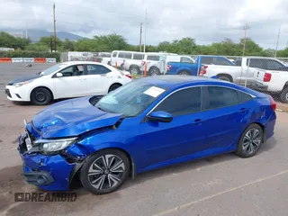 2018 Honda Civic EX-T z VIN JHMFC1F31JX018152, wystawiony jako IAAI lot #41935394 z przebiegiem 60 333 mil mil oraz . Historia ofert i sprzedaży dostępna na DreamBid. Obrazek 6.
