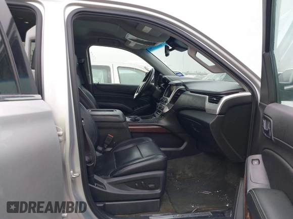 2015 GMC Yukon SLT z VIN 1GKS1BKC0FR172661, wystawiony jako IAAI lot #41911331 z przebiegiem 171 815 mil mil oraz . Historia ofert i sprzedaży dostępna na DreamBid. Obrazek 5.