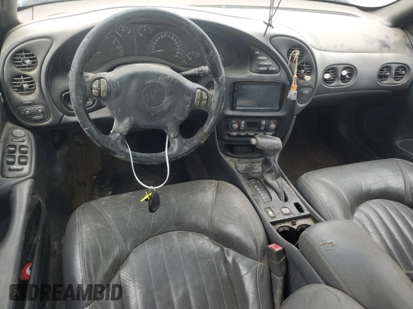2001 Pontiac Bonneville SLE z VIN 1G2HY54K614247302, wystawiony jako Copart lot #55119465 z przebiegiem 257 120 mil mil oraz Szkody całkowita. Historia ofert i sprzedaży dostępna na DreamBid. Obrazek 8.