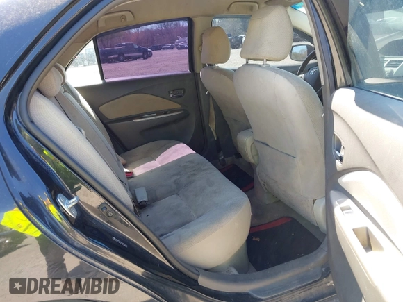 2009 Toyota Yaris with VIN JTDBT903294057773, listed as a IAAI auction lot 42071027 with 164,128 mi miles. Bid and sale history available at carsss.com. Image 8.