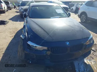 2015 BMW 3 Series 328i with VIN WBA3C1C57FK120647, listed as a IAAI auction lot 41699476 with 84,933 mi miles and . Bid and sale history available at DreamBid. Image 6.