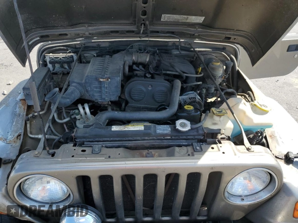 2003 Jeep Wrangler SE with VIN 1J4FA29183P335057, listed as a Copart auction lot 63523444 with 161,694 mi miles and Salvage title. Bid and sale history available at DreamBid. Image 11.
