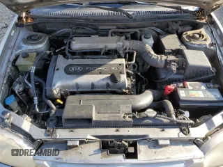 2001 Kia Sephia z VIN KNAFB121715014673, wystawiony jako Copart lot #71712174 z przebiegiem 83 277 mil mil oraz Szkody całkowita. Historia ofert i sprzedaży dostępna na DreamBid. Obrazek 11.
