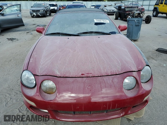 1998 Toyota Celica GT z VIN JT5FG02T5W0048269, wystawiony jako Copart lot #76887854 z przebiegiem 147 694 mil mil oraz Szkoda całkowita • Salvage title. Historia ofert i sprzedaży dostępna na DreamBid. Obrazek 5.