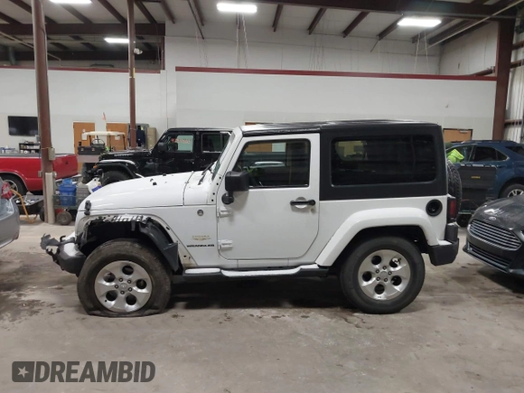 2014 Jeep Wrangler Sahara with VIN 1C4AJWBG7EL234625, listed as a IAAI auction lot 41726770 with 128,080 mi miles and . Bid and sale history available at DreamBid. Image 14.