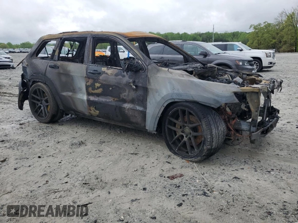 2012 Jeep Grand Cherokee SRT8 with VIN 1C4RJFDJ0CC113413, listed as a Copart auction lot 51763425 with 0 mi miles and Non Repairable. Bid and sale history available at carsss.com. Image 4.